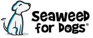 The seaweed for dogs logo. It has a dog sitting on the left side facing the words seaweed for dogs, which is written in a unique font on the right. The o in dogs has a paw print in the center of it. The dogs tail is wagging.